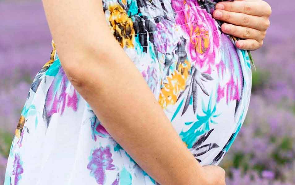 Pregnant Woman Holding Tummy